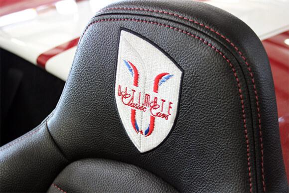 Ultimate Classic Cars logo on seat